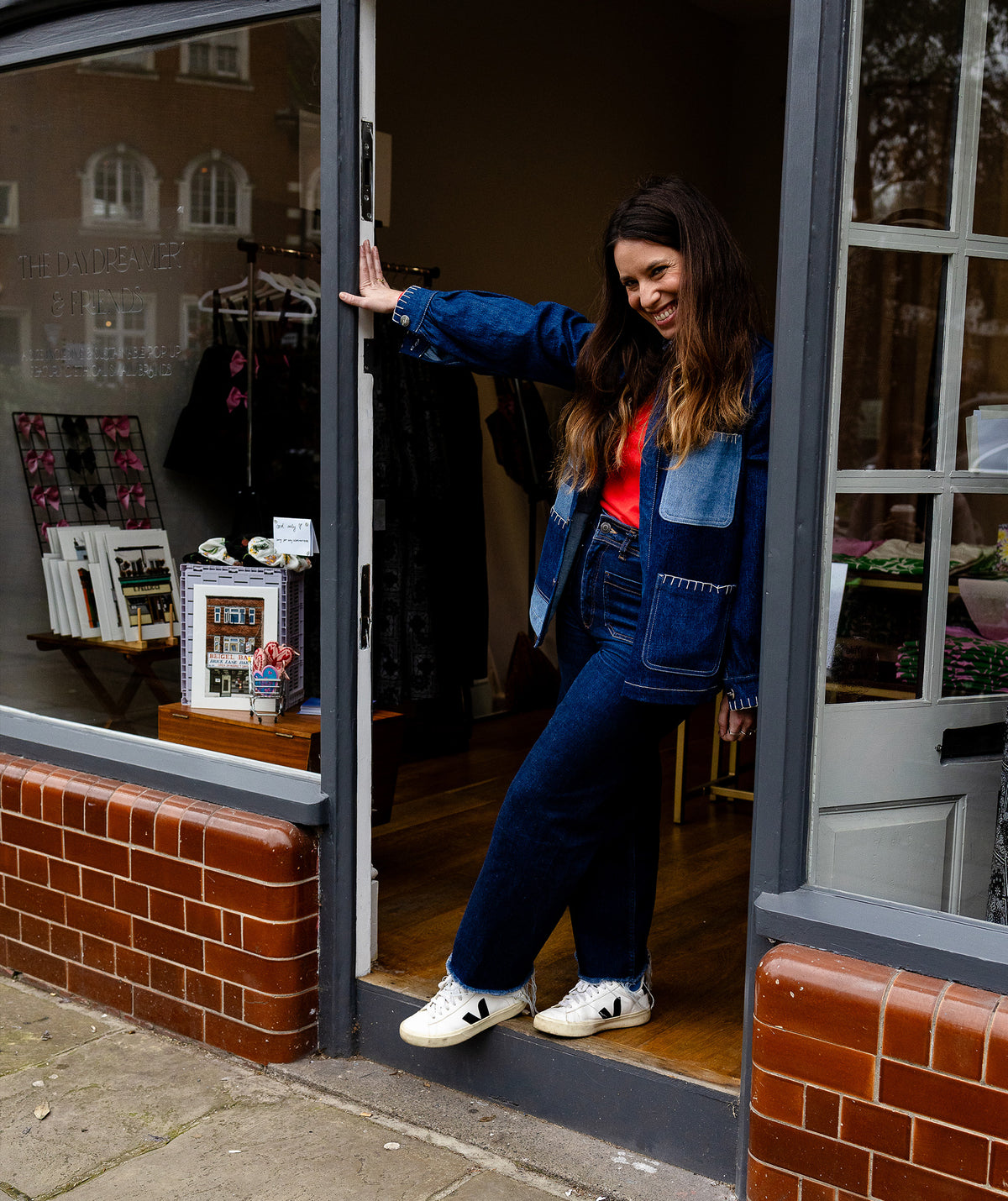 Ana Gallego at a front door with her sketchbook