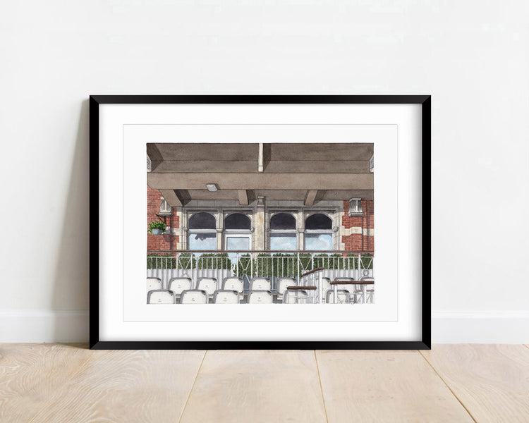 Watercolour giclée print of the stand at the Oval cricket ground, shown in a black frame.